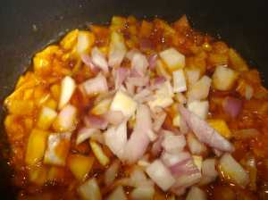 onion frying before putting in the roasted fish